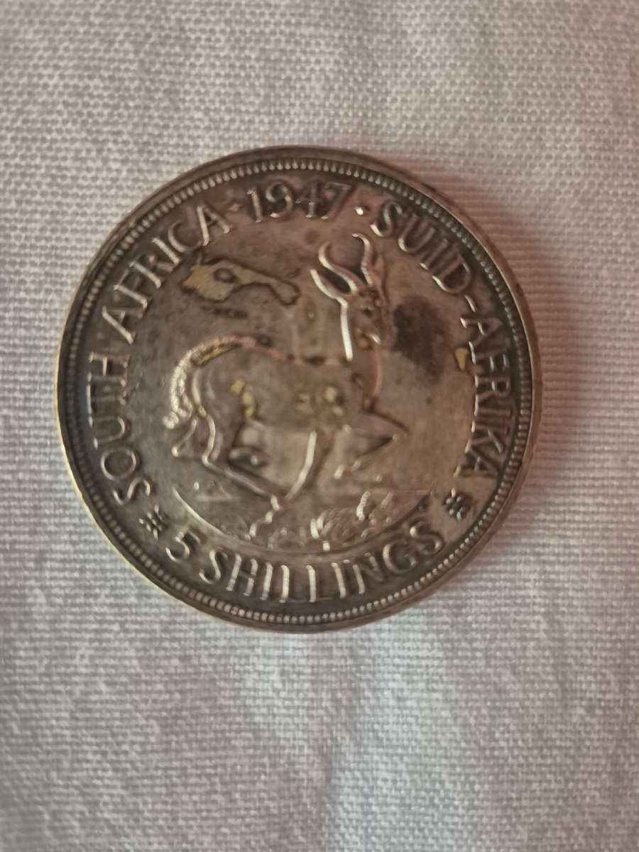 12× 5 shillings coins ..1 bid for lot see photos