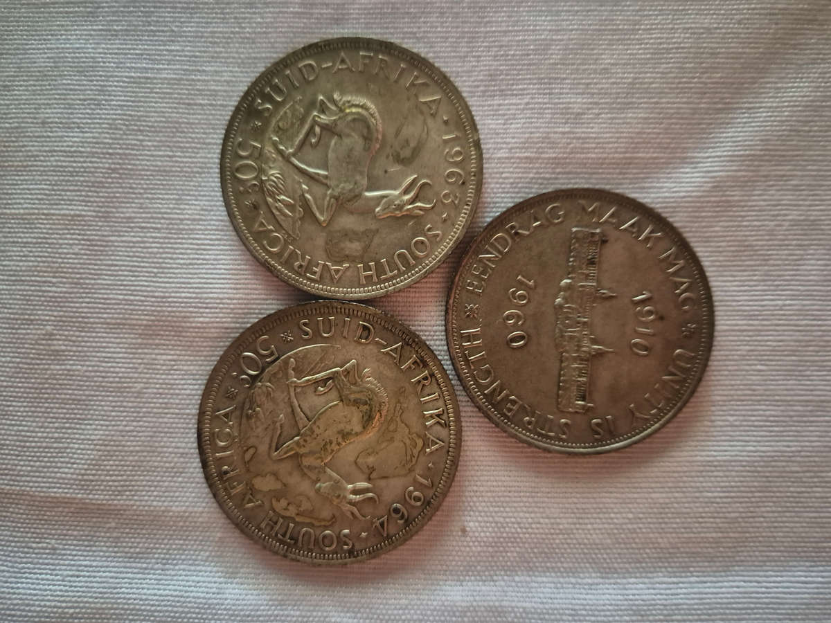 3 50c coins see photo...1 bid for all