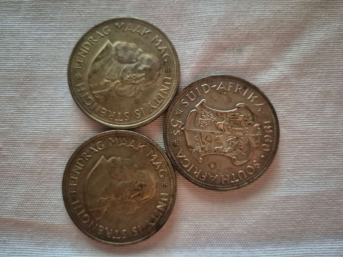 3 50c coins see photo...1 bid for all