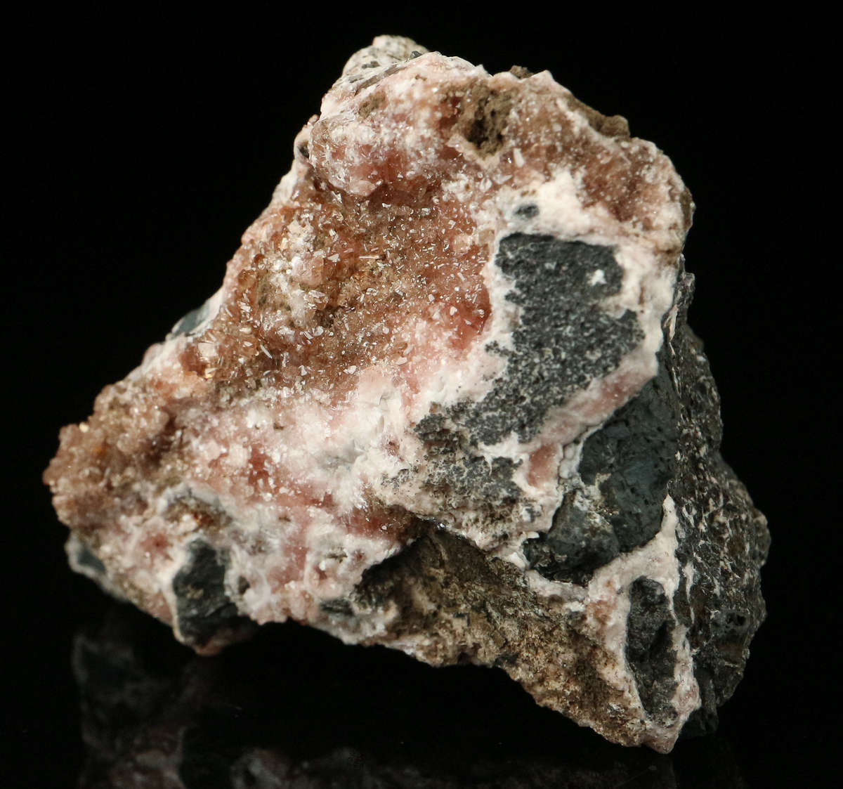 Rhodochrosite on Matrix,"N'Chwaning II Mine, Kalahari Manganese Field, Northern Cape, South Africa.
