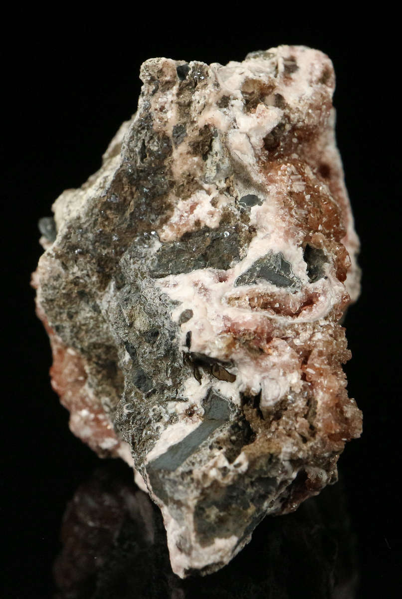 Rhodochrosite on Matrix,"N'Chwaning II Mine, Kalahari Manganese Field, Northern Cape, South Africa.