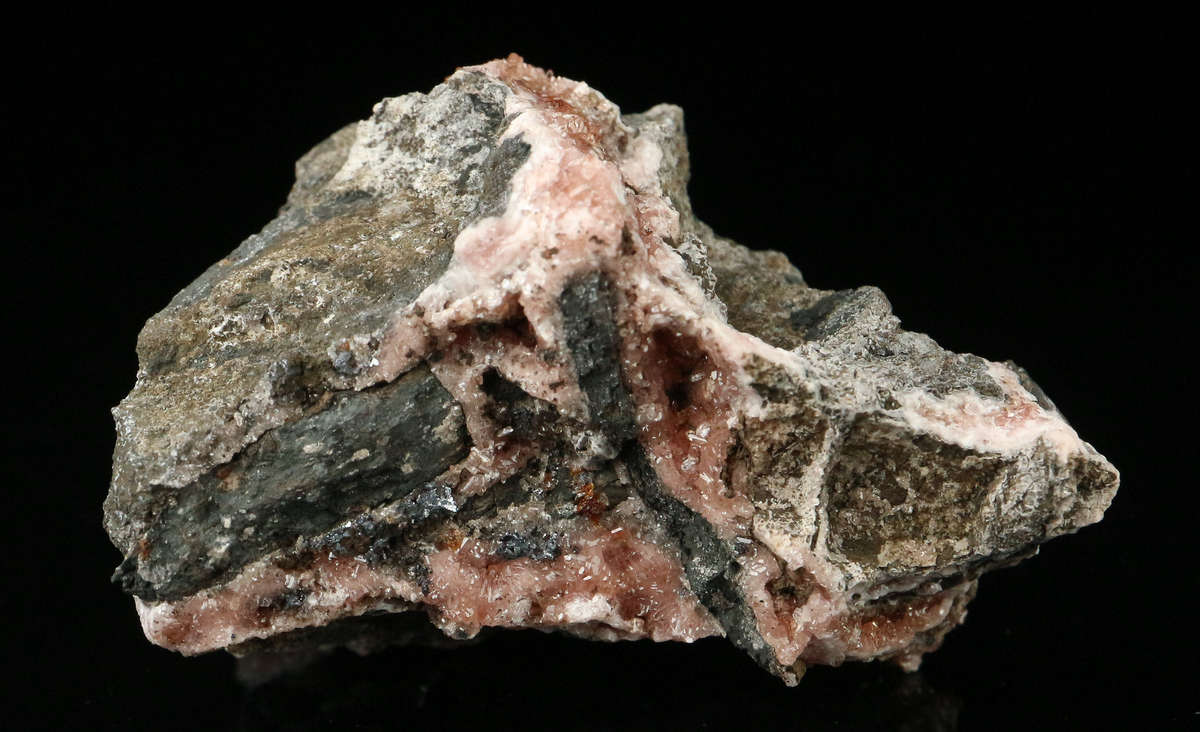 Rhodochrosite on Matrix,"N'Chwaning II Mine, Kalahari Manganese Field, Northern Cape, South Africa.