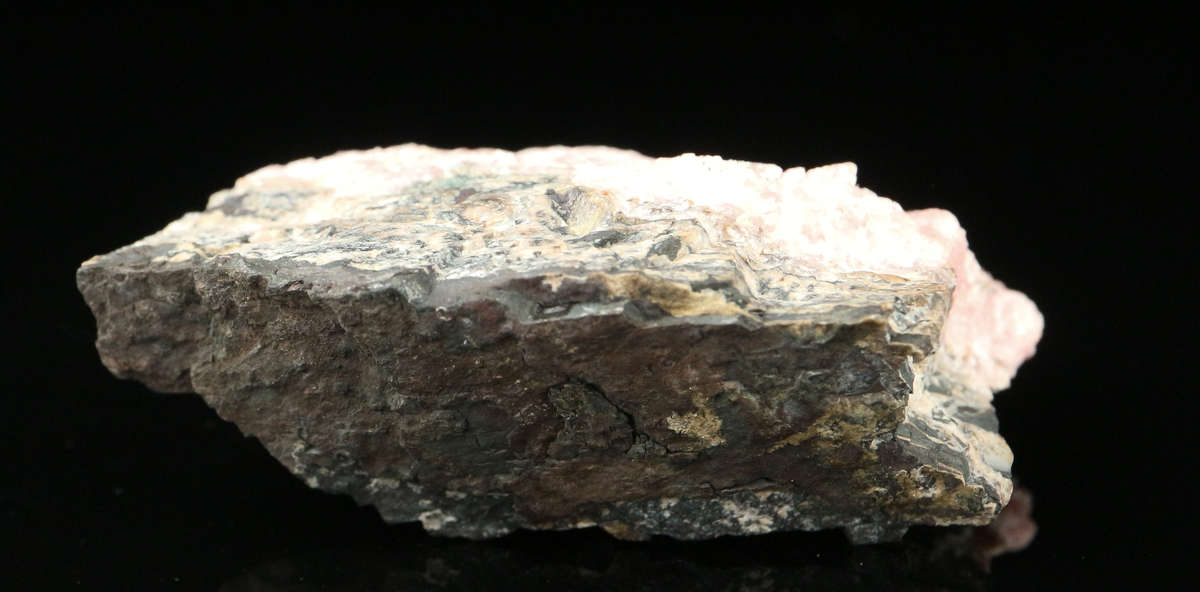 Rhodochrosite on Matrix,"N'Chwaning II Mine, Kalahari Manganese Field, Northern Cape, South Africa.