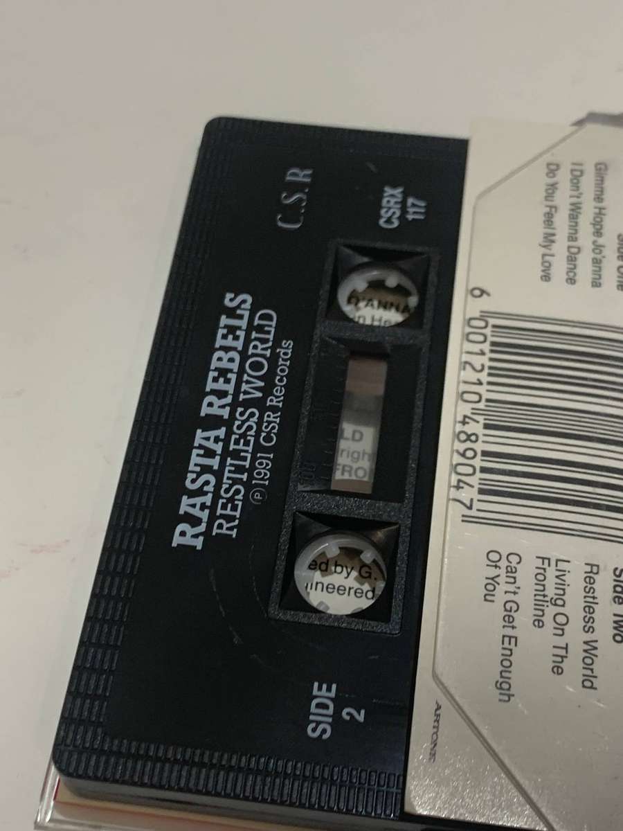 Cassette Tape - Rasta Rebels . Restless World - Not Tested / See Pics