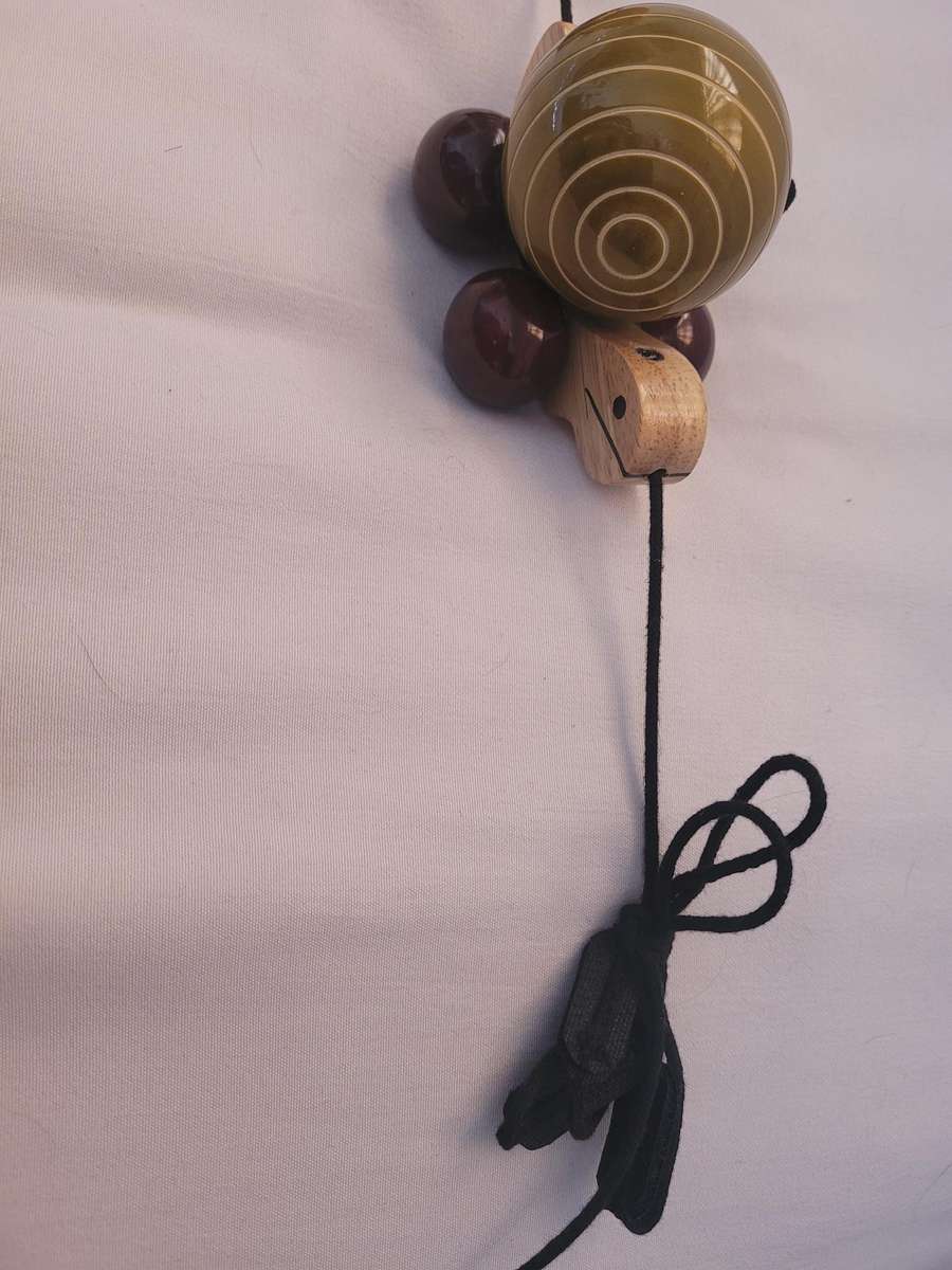 HAND MADE WOODEN TORTOISE-TRIPPLE PULL ALONG, FACINATING TOY. WHEELS TURN THE SHELLS. UNUSED.