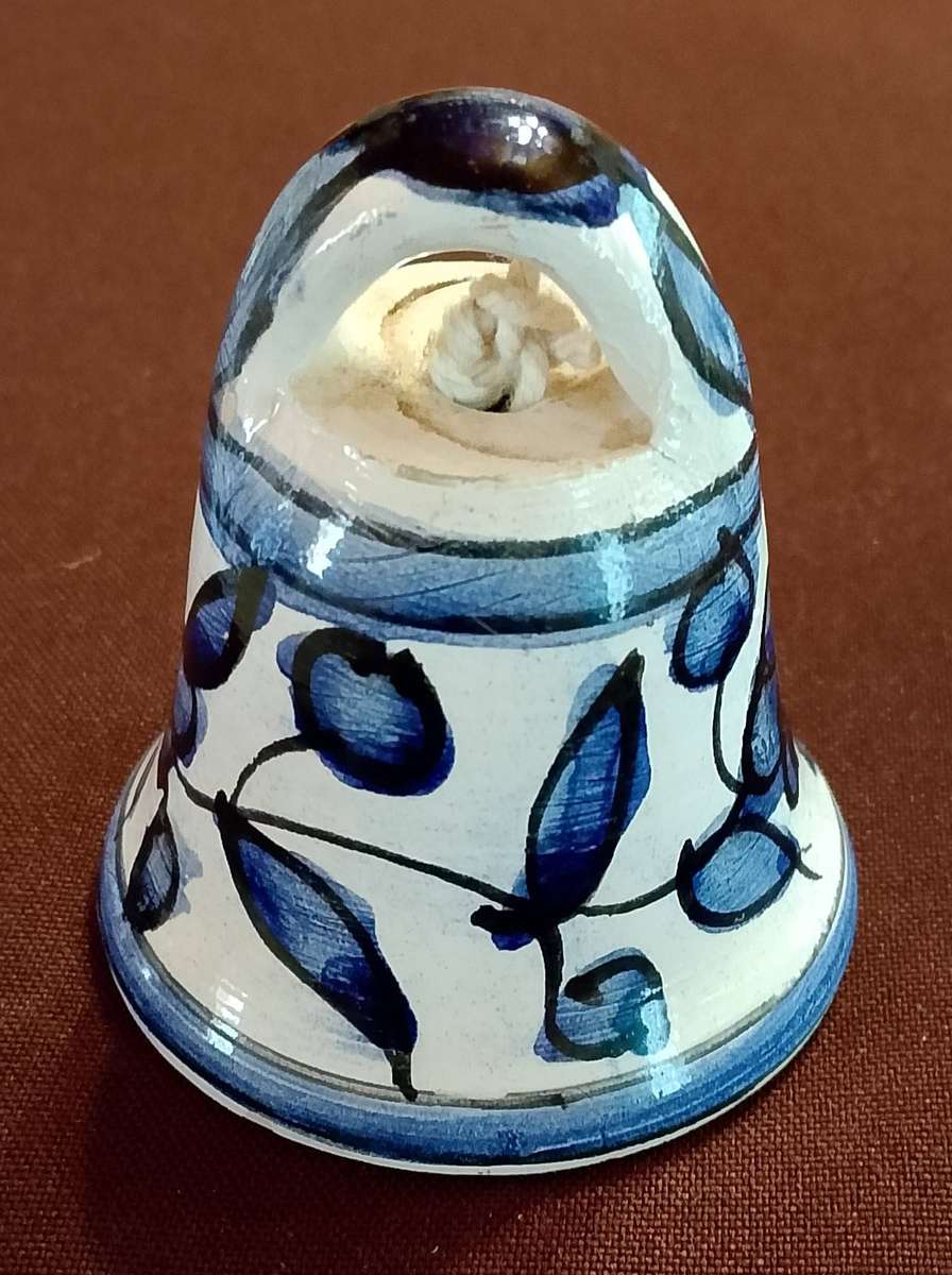 Handcrafted ceramic bell with blue and white floral motif