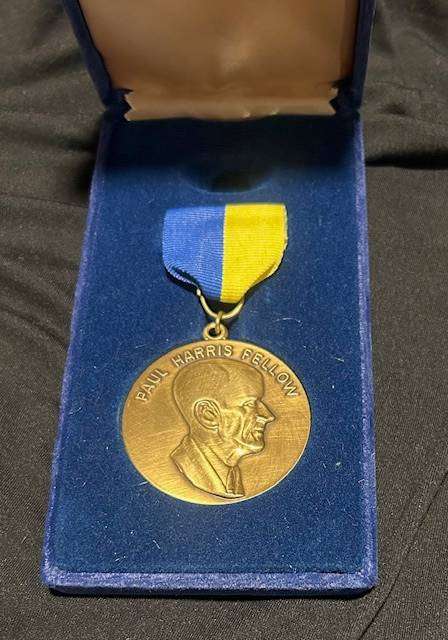 Paul Harris Fellow award, which includes the medallion