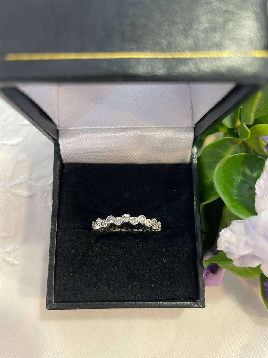 Sterling Silver "925" stamped round Eternity Wedding Band ring with accent CZ'S!