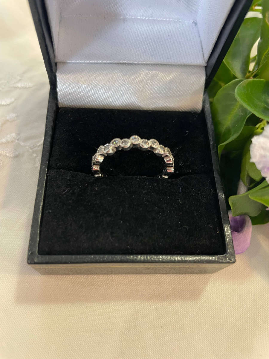 Sterling Silver "925" stamped round Eternity Wedding Band ring with accent CZ'S!