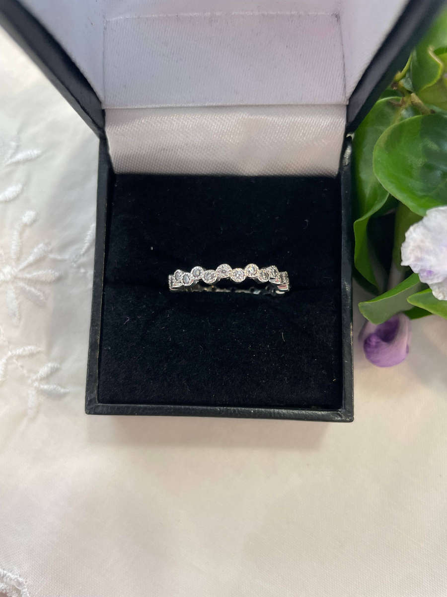 Sterling Silver "925" stamped round Eternity Wedding Band ring with accent CZ'S!