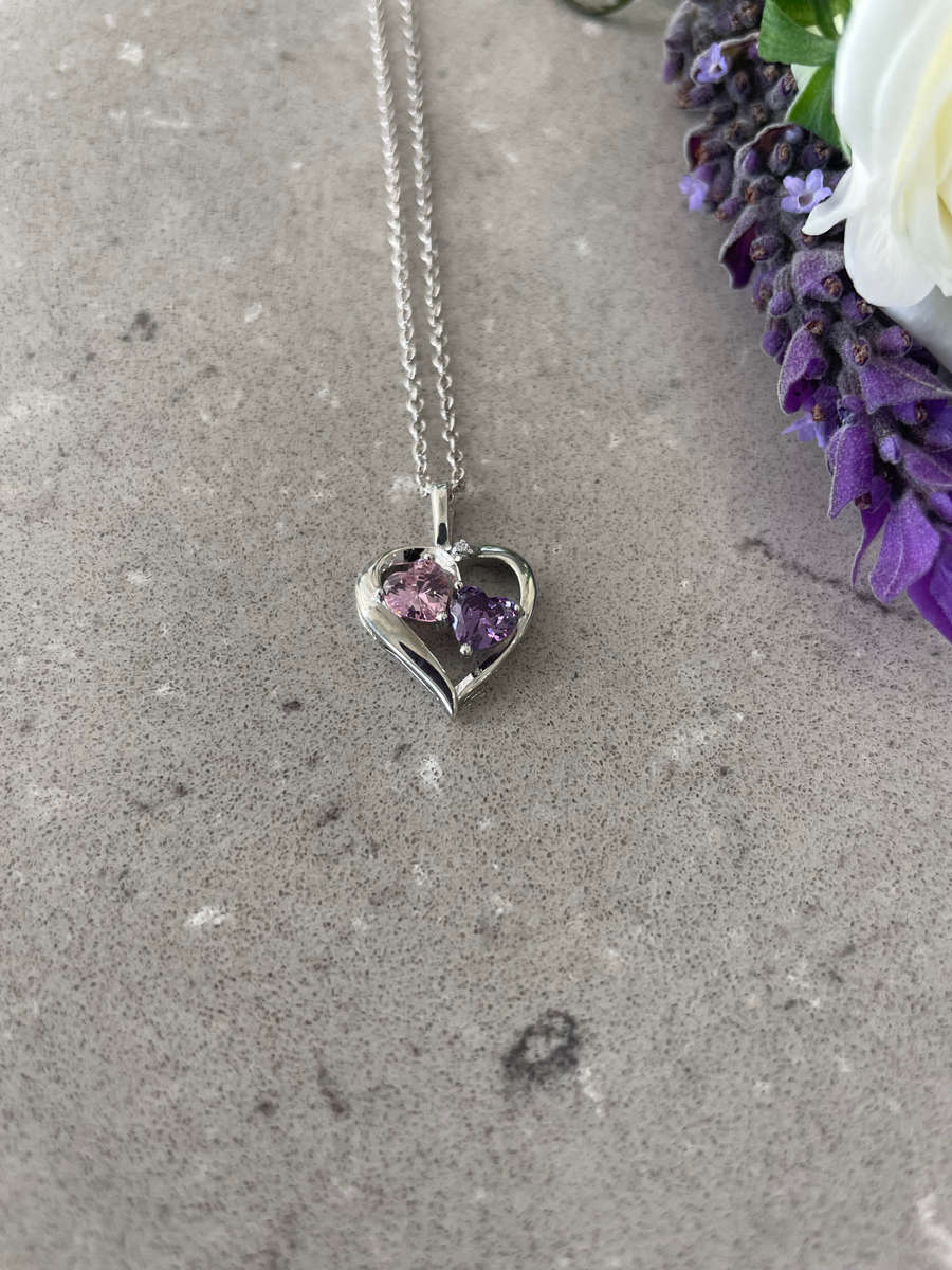 Heart pendant and chain 925 sterling silver featuring two amethyst/tourmaline coloured stones.