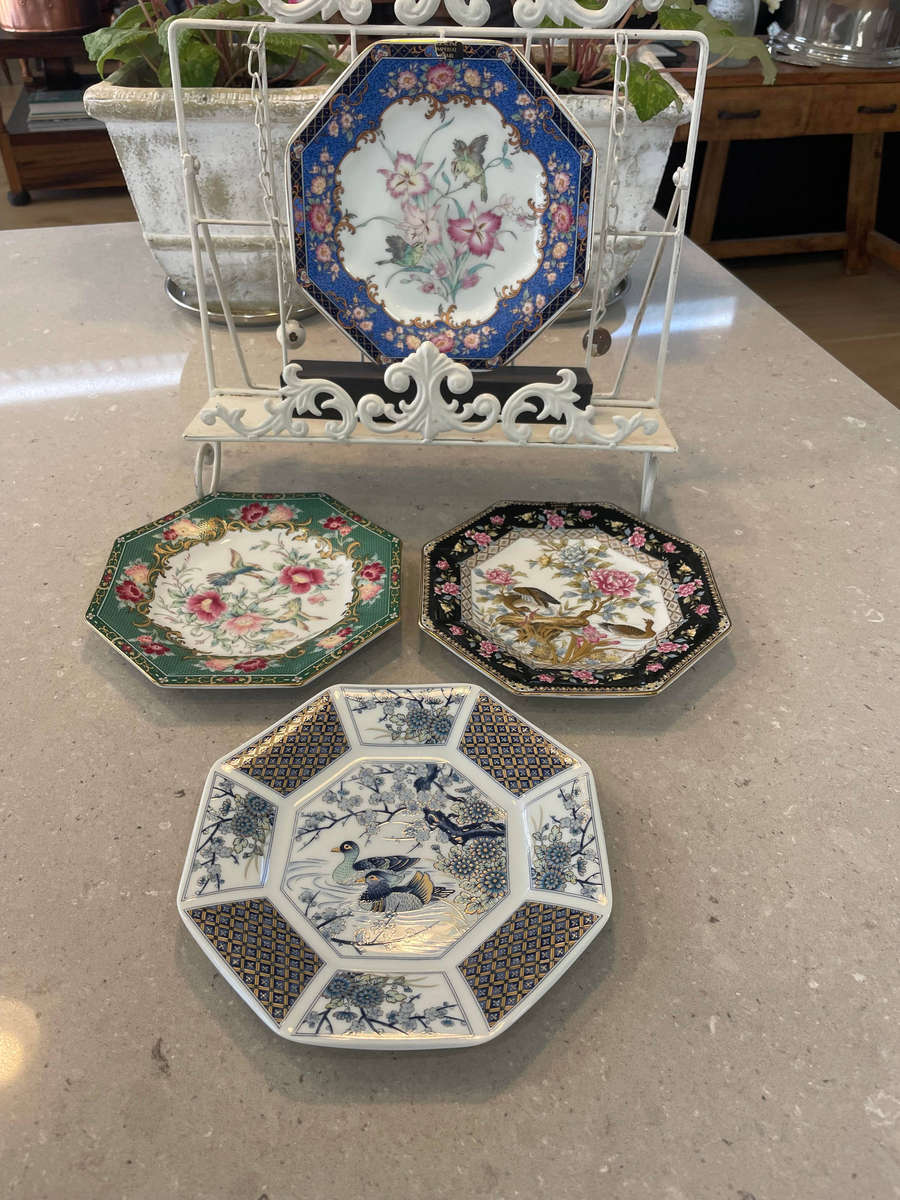 Japanese porcelain octagonal "Imari" plates with floral and bird designs. All 4 plates.