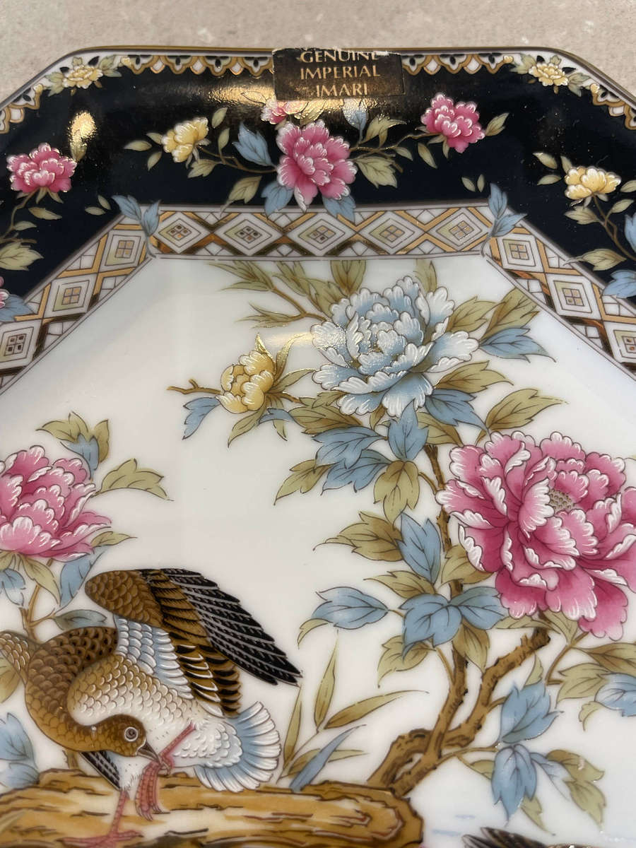 Japanese porcelain octagonal "Imari" plates with floral and bird designs. All 4 plates.