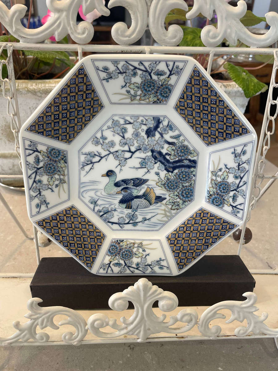 Japanese porcelain octagonal "Imari" plates with floral and bird designs. All 4 plates.