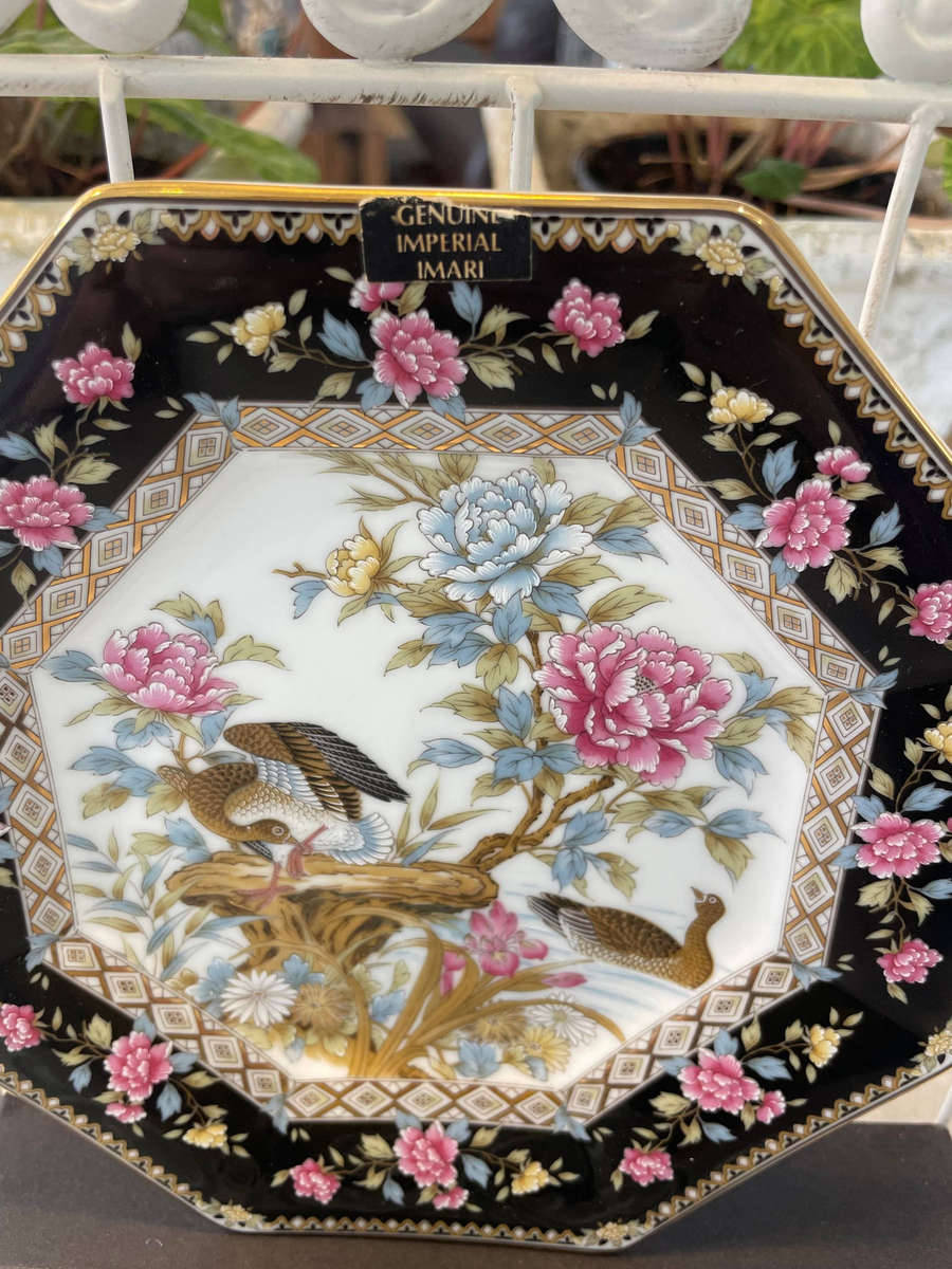 Japanese porcelain octagonal "Imari" plates with floral and bird designs. All 4 plates.