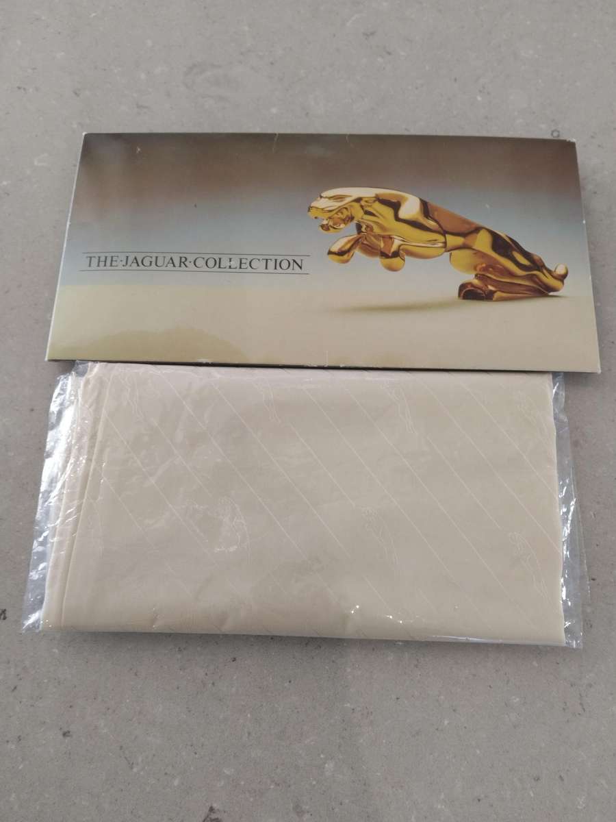 "THE - JAQUAR - COLLECTION" 100% pure silk scarf made in Italy.