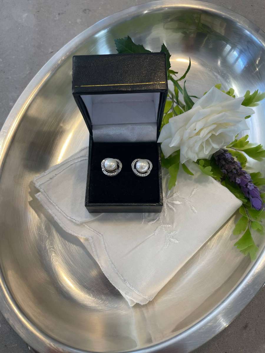 Enhanced cultured freshwater pearls set in 925 sterling silver.