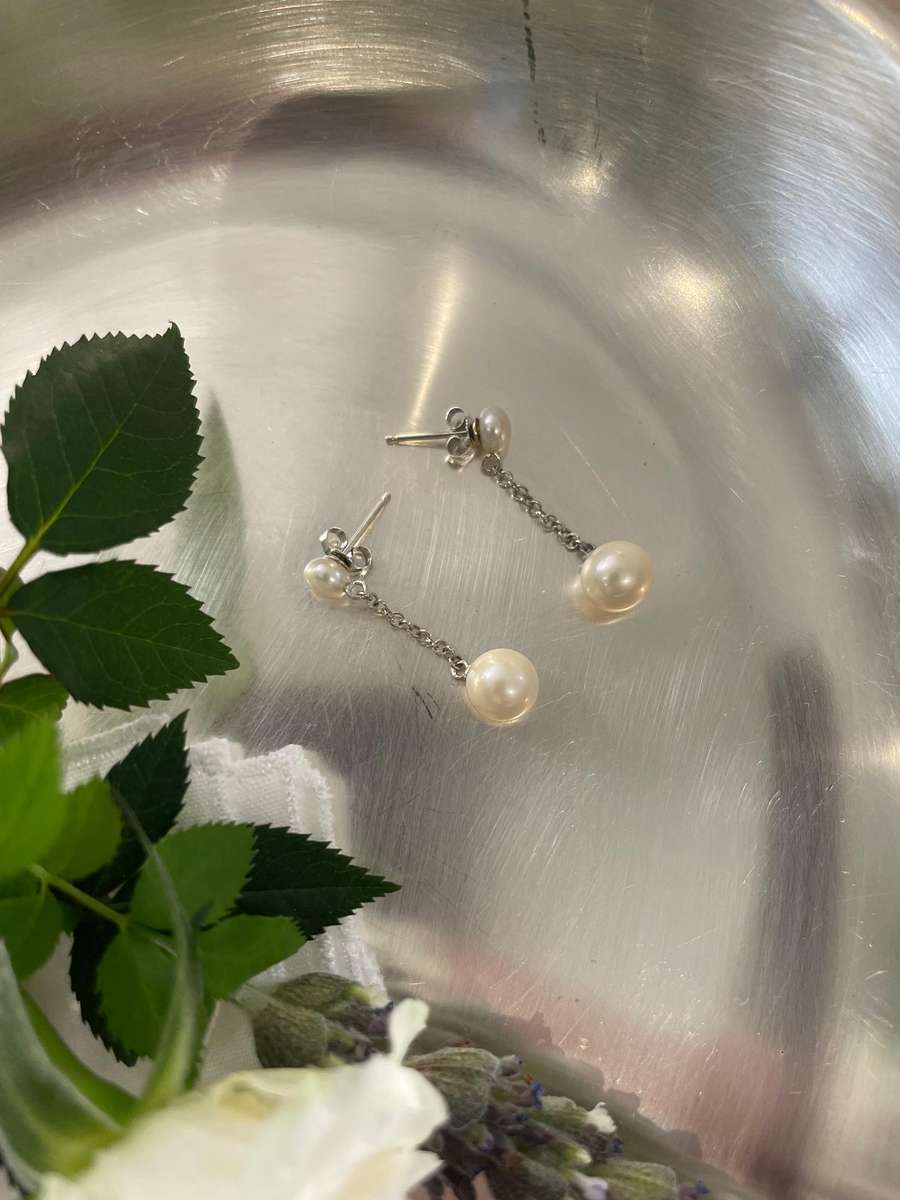 Delicate freshwater pearl double drop stud earrings 925 sterling silver setting and studs.