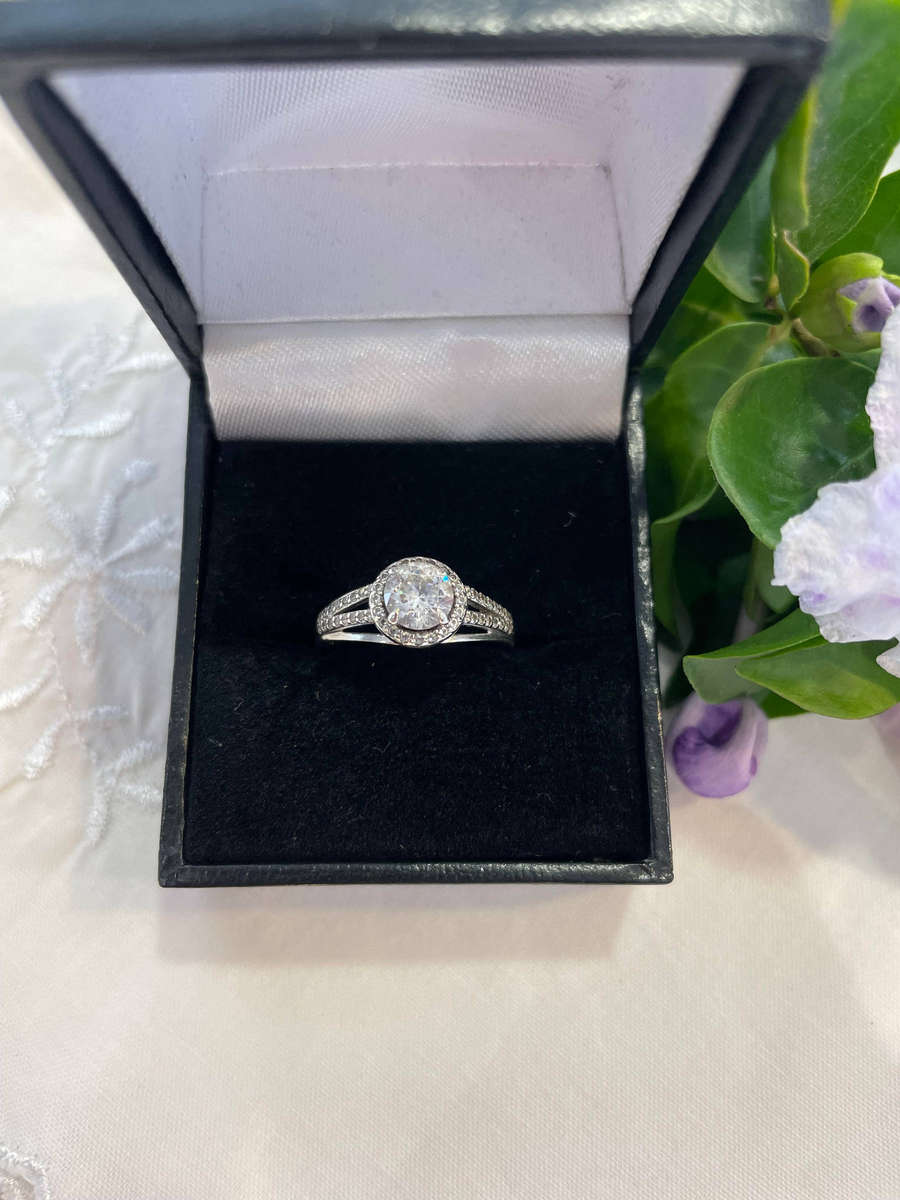 Bright Sterling Silver 925 stamped Engagement, promise ring with CZ surrounded by smaller CZ!