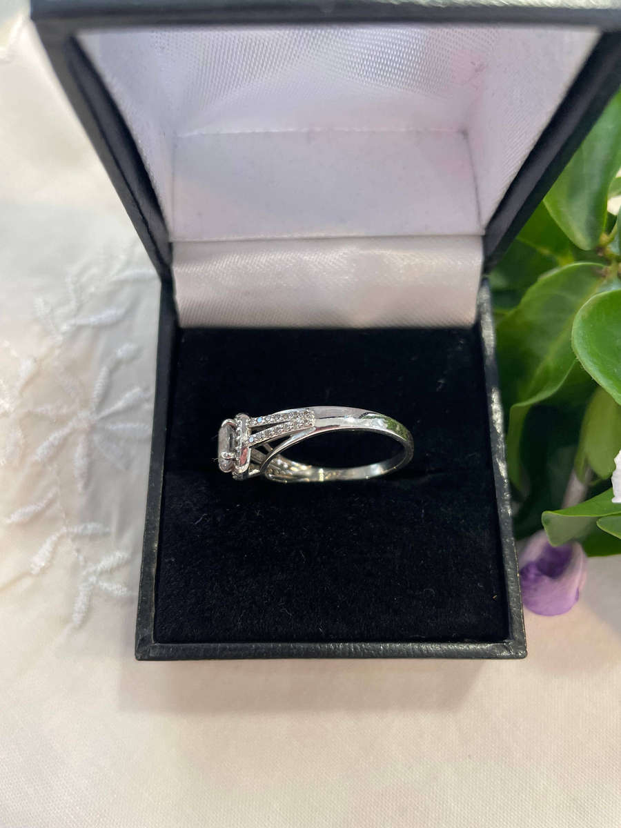 Bright Sterling Silver 925 stamped Engagement, promise ring with CZ surrounded by smaller CZ!