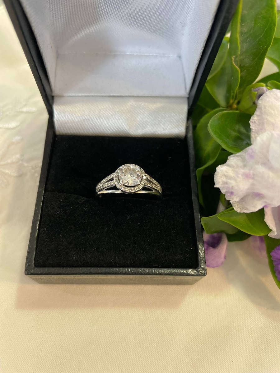 Bright Sterling Silver 925 stamped Engagement, promise ring with CZ surrounded by smaller CZ!