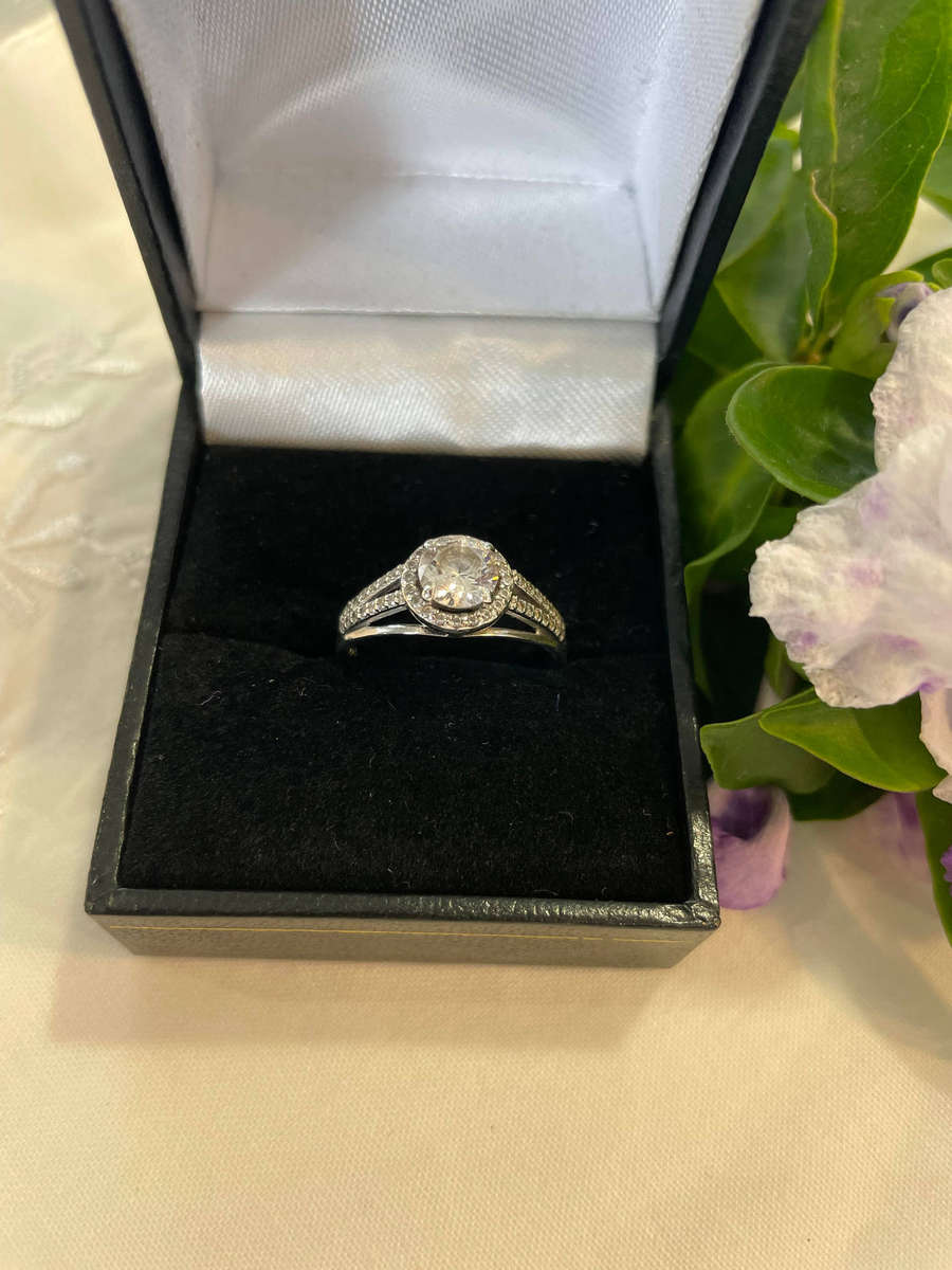 Bright Sterling Silver 925 stamped Engagement, promise ring with CZ surrounded by smaller CZ!