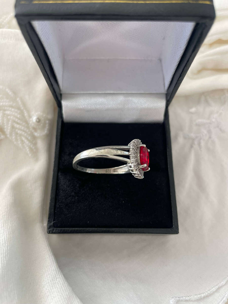 Sterling Silver 925 Split Shank Band & Oval-cut Simulated Ruby and Cubic Zirconia Halo Ring.