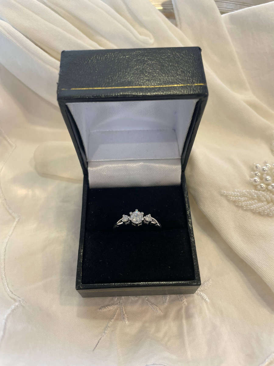 Sterling Silver S925 Trilogy Engagement/Promise ring with One Large CZ flanked by two Smaller CZ.