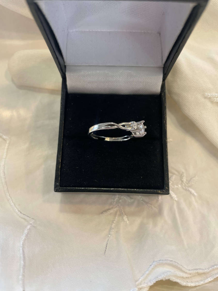 Sterling Silver S925 Trilogy Engagement/Promise ring with One Large CZ flanked by two Smaller CZ.
