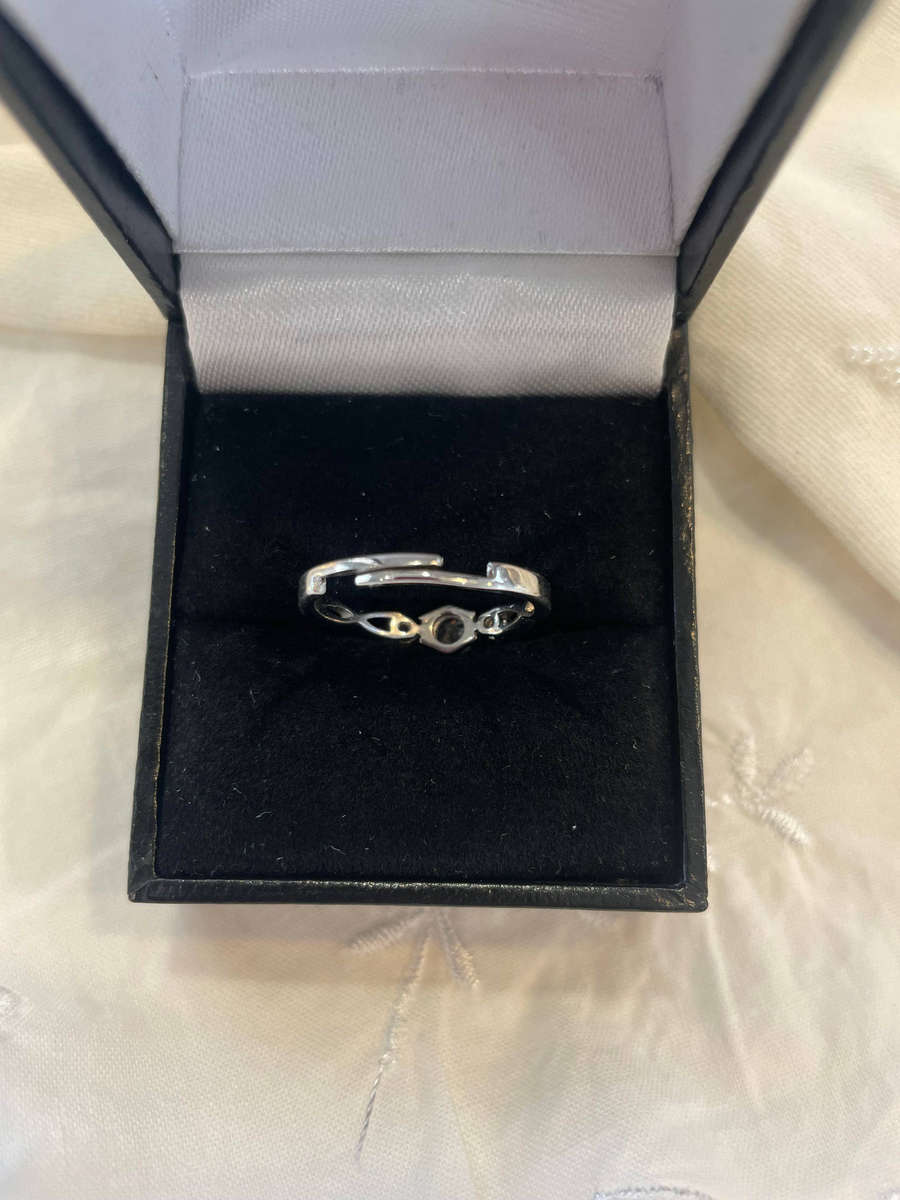 Sterling Silver S925 Trilogy Engagement/Promise ring with One Large CZ flanked by two Smaller CZ.