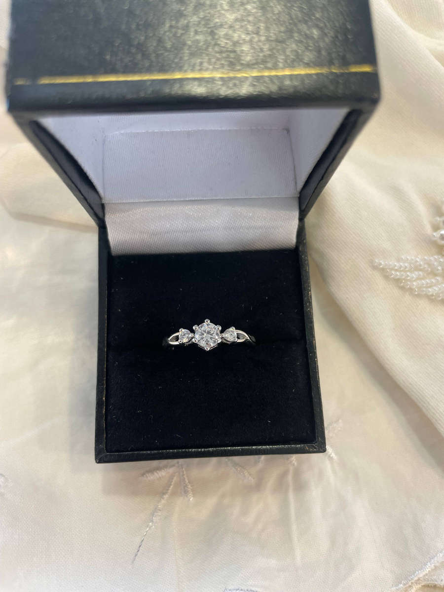 Sterling Silver S925 Trilogy Engagement/Promise ring with One Large CZ flanked by two Smaller CZ.