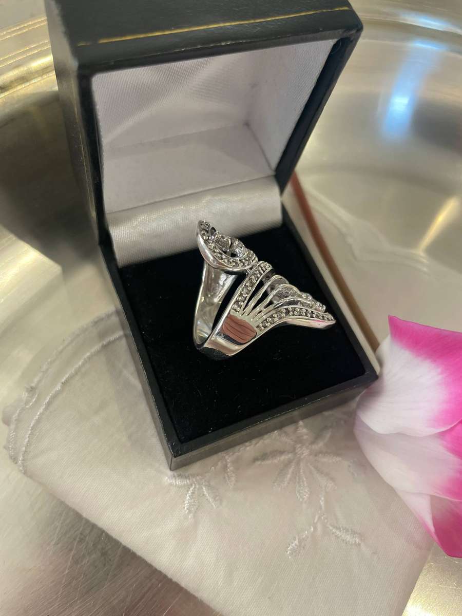 Unique Design 925 Sterling Silver "Stars Bypass" cocktail ring. Adorn with small clear stones!