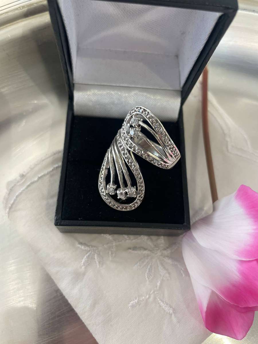 Unique Design 925 Sterling Silver "Stars Bypass" cocktail ring. Adorn with small clear stones!