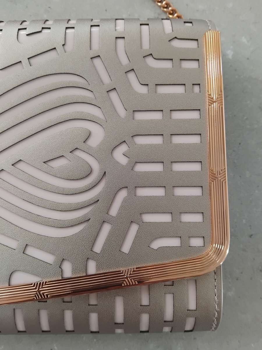 TED BAKER LONDON - Rose Gold Bree Cut Out Bow Clutch Handbag with removeable chain in original bag!