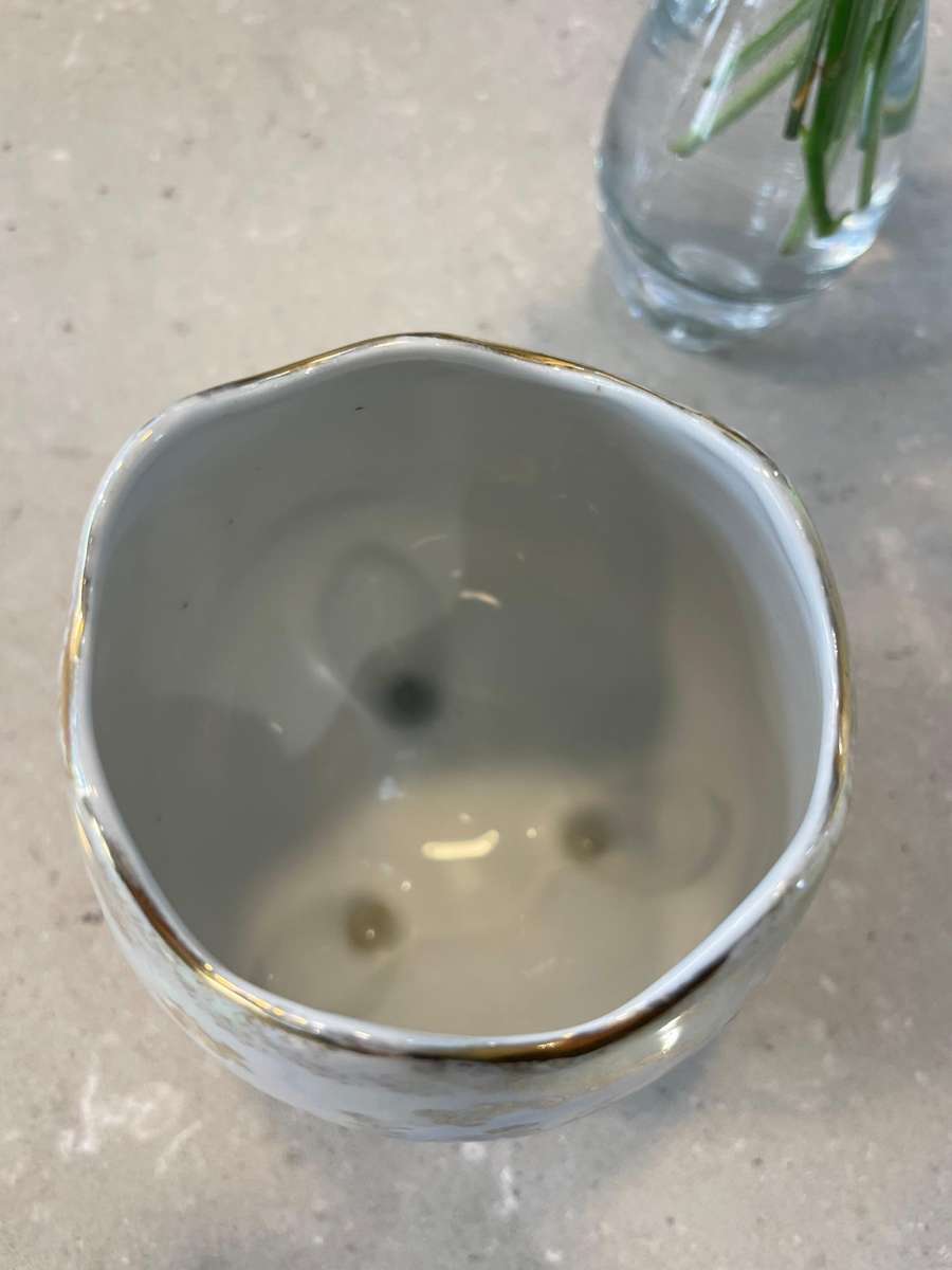 iridescent porcelain egg-shaped vase