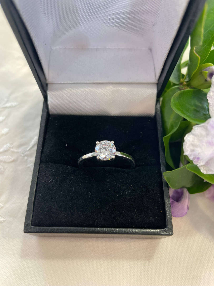 Sterling Silver "925" stamped, solid solitaire ring with CZ!