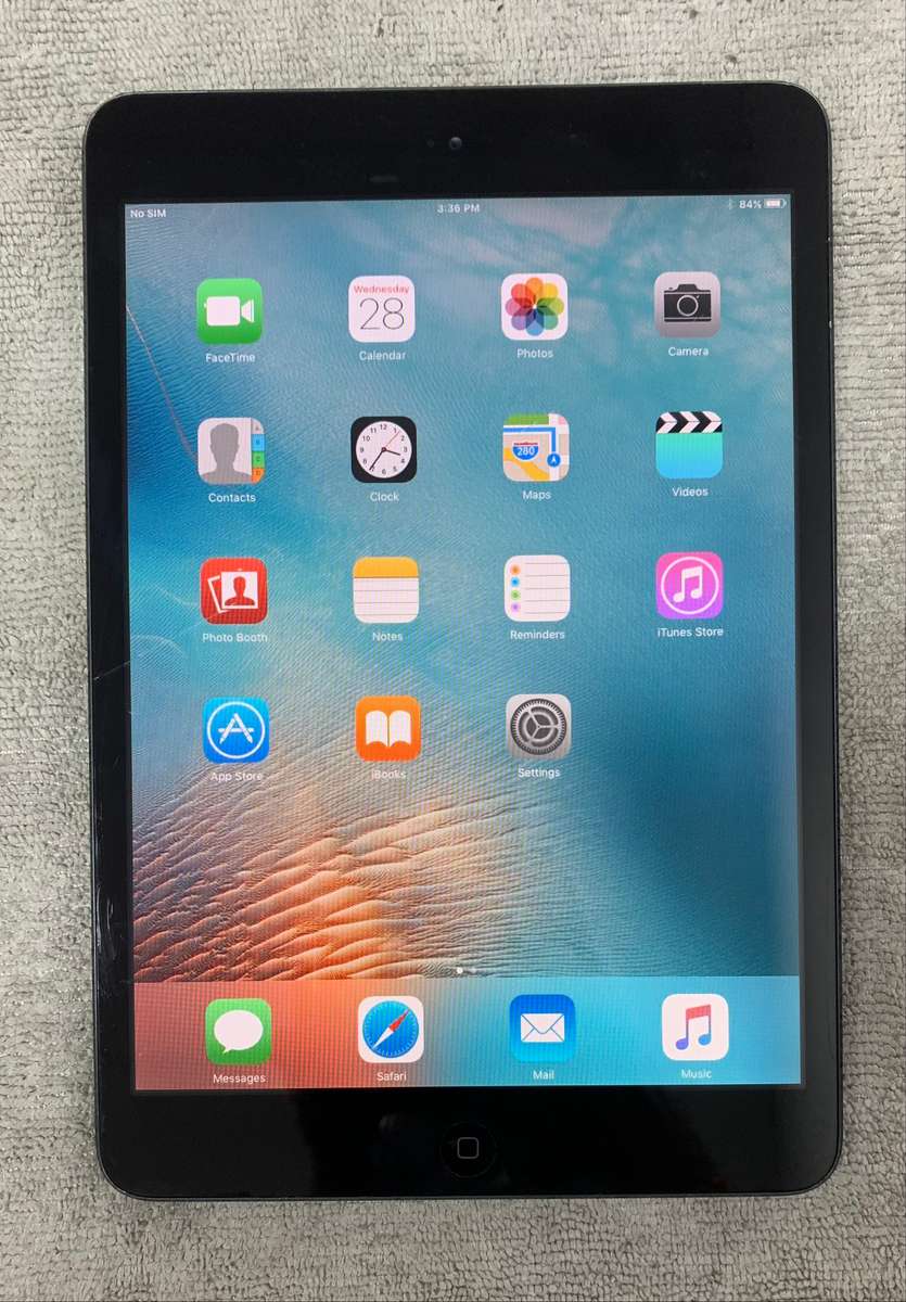 ipad mini 16gb wifi + cellular top Glass Cracked  (pre owned)