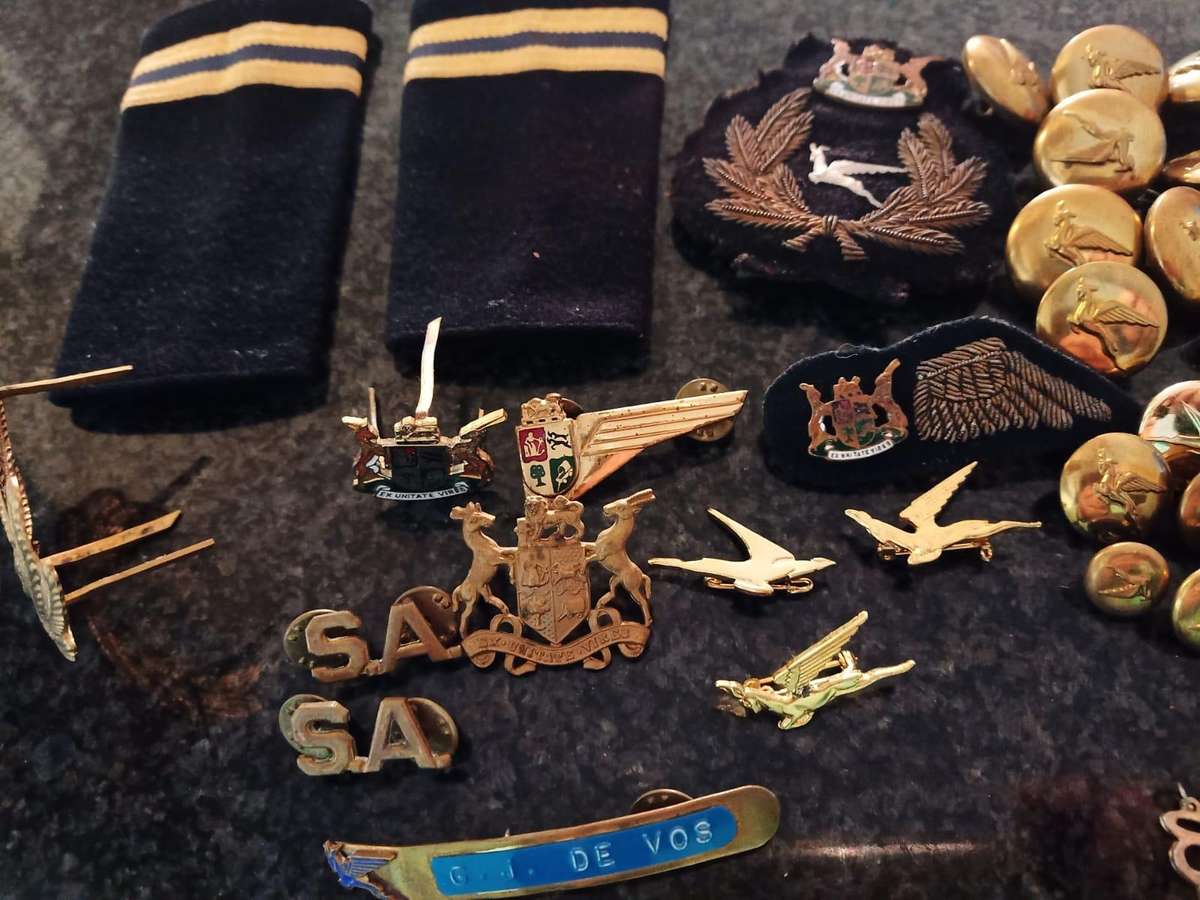 Lot of South African badges and buttons