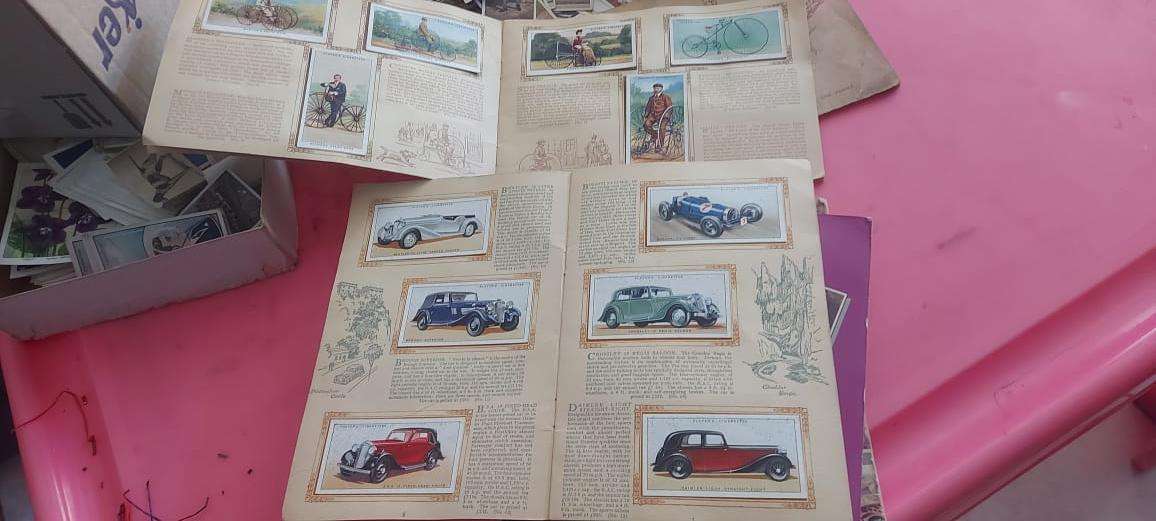 OVER 1000 CIGARETTE CARDS AND ALBUMS AND TWO CIGARETTE CARDS VALUES BOOKS