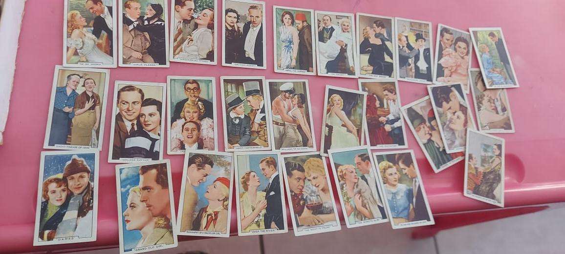 OVER 1000 CIGARETTE CARDS AND ALBUMS AND TWO CIGARETTE CARDS VALUES BOOKS