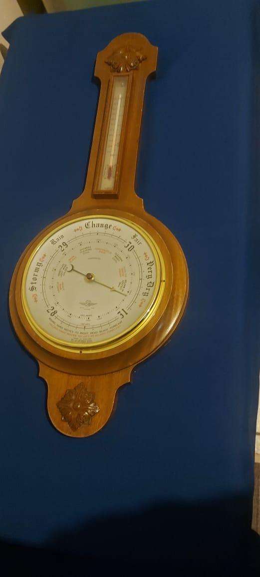 This vintage barometer thermometer