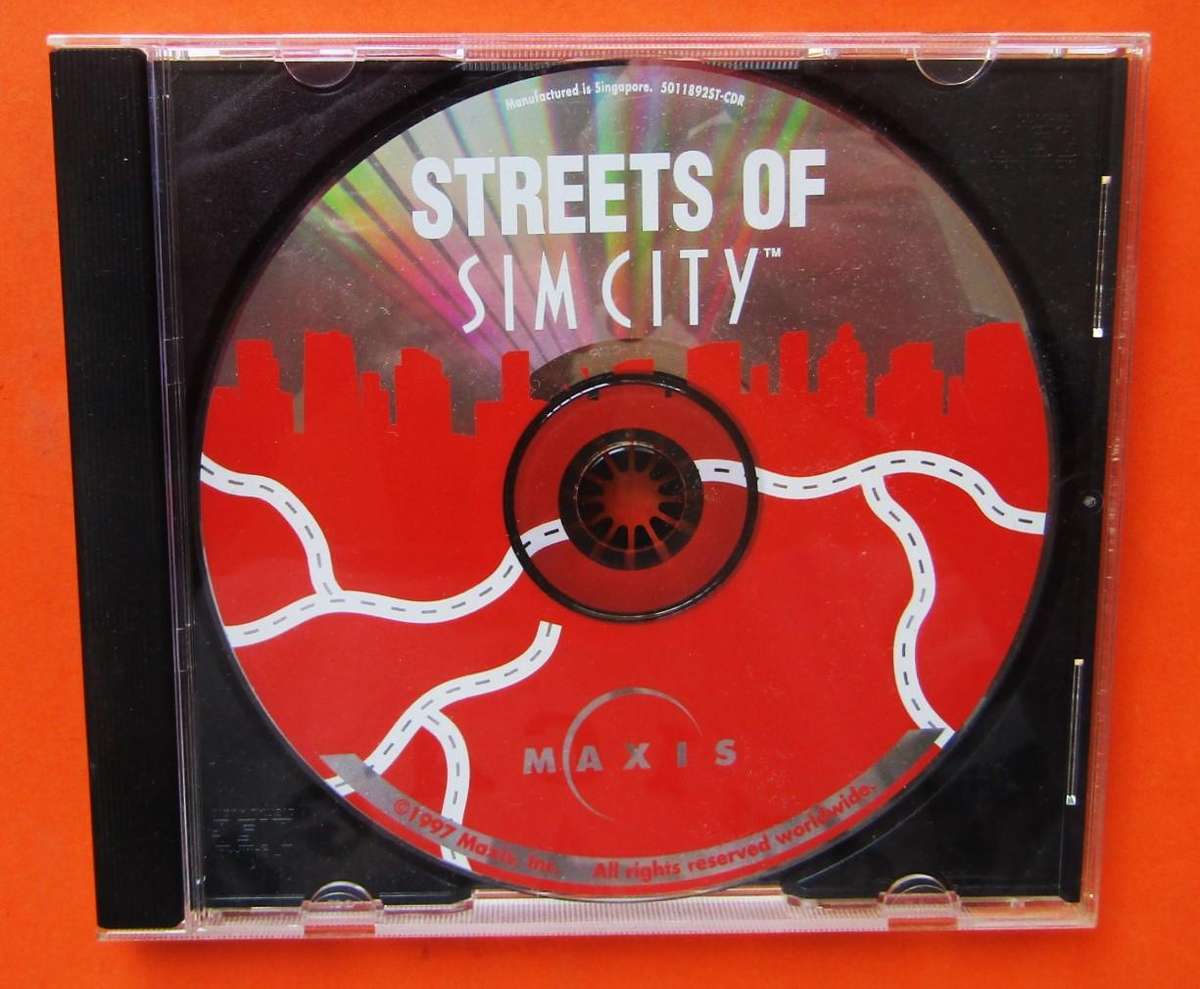 Box and Manuals for a Sim City 2000 PC Game