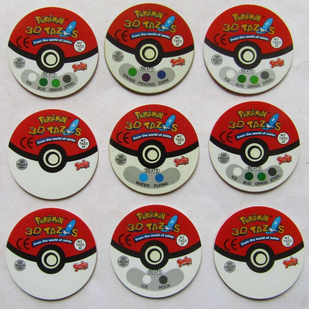 Lot of 9 Pokemon WJ 3D Tazos by Simba