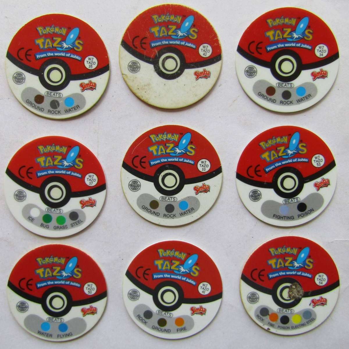 Lot of 9 Pokemon WJ Tazos by Simba