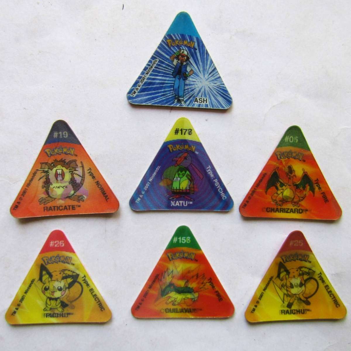 Lot of 7 Pokemon Trio Tazos by Simba