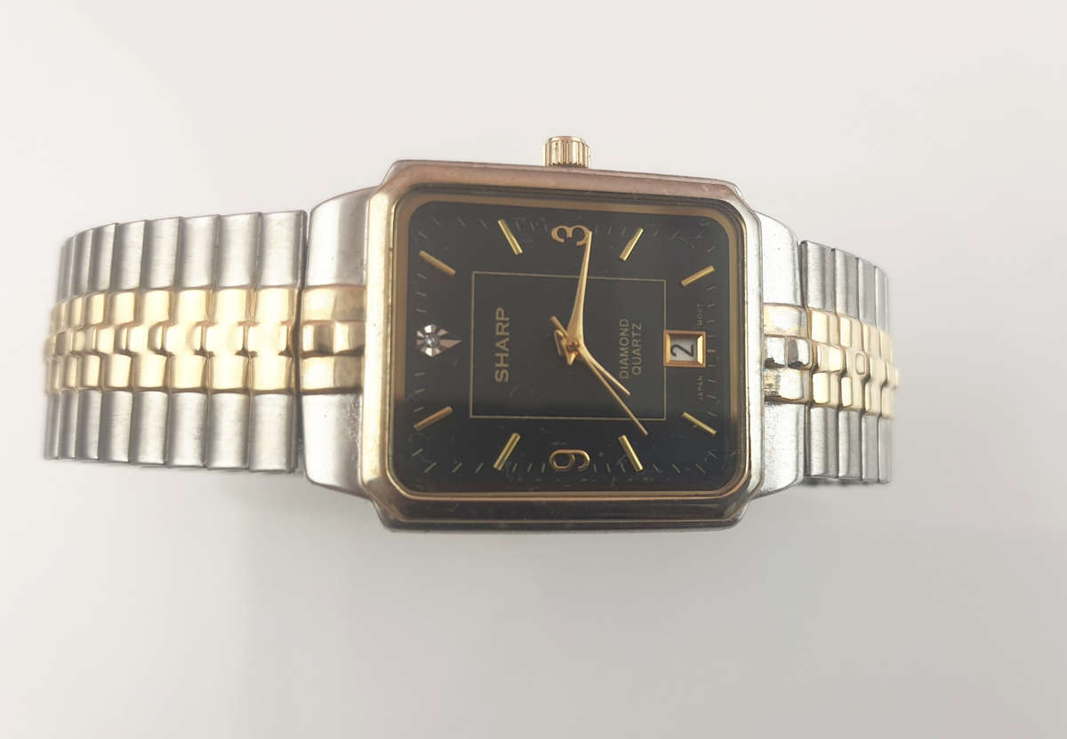 SHARP DIAMOND QUARTZ WATCH