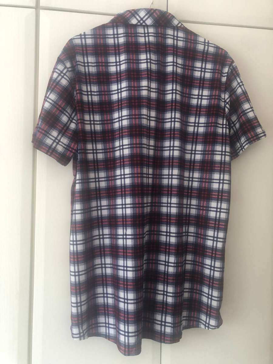 Two plaid short sleeve men shirts.