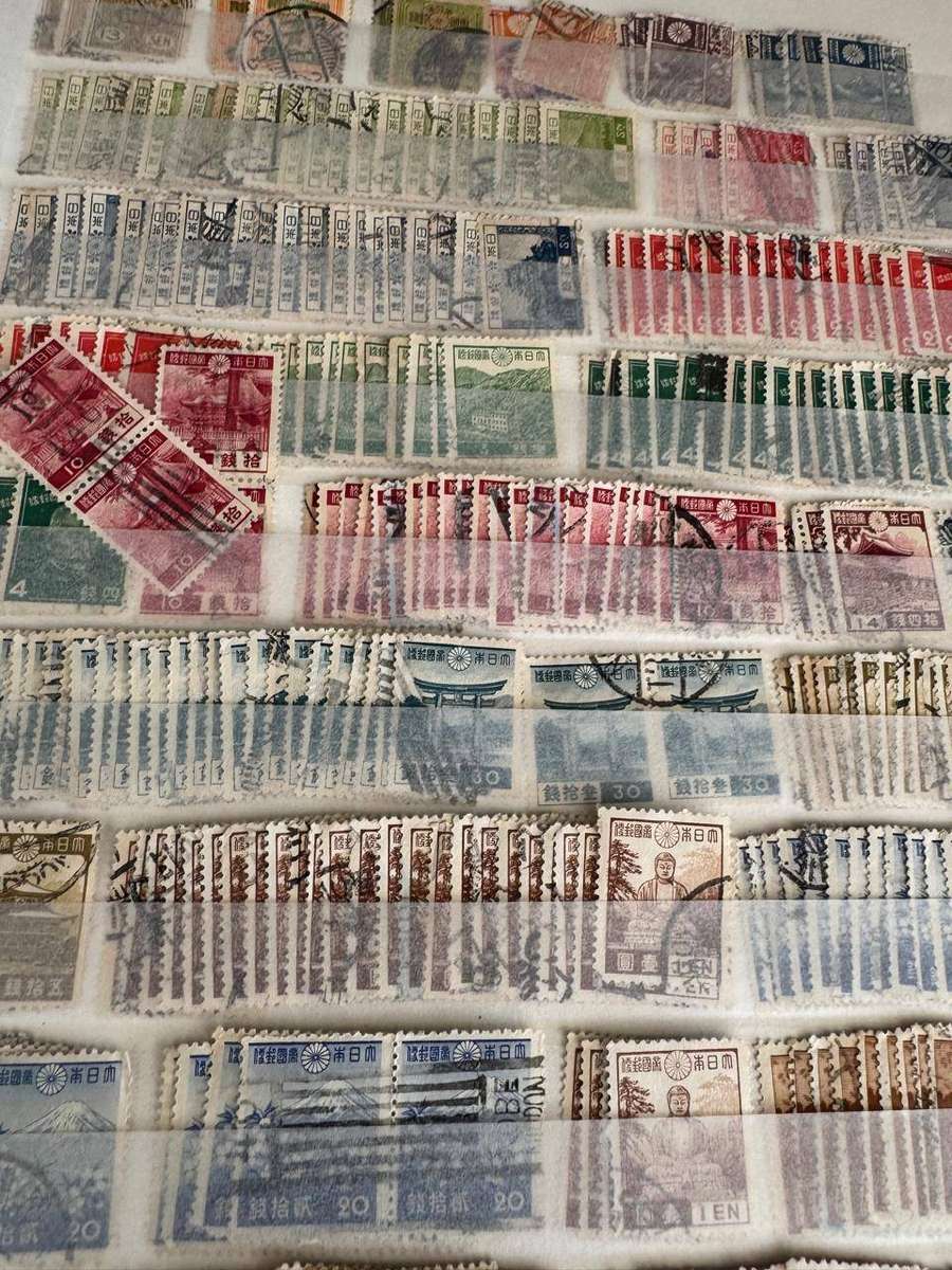 Canadian Stamp Album with 2 pages Japan