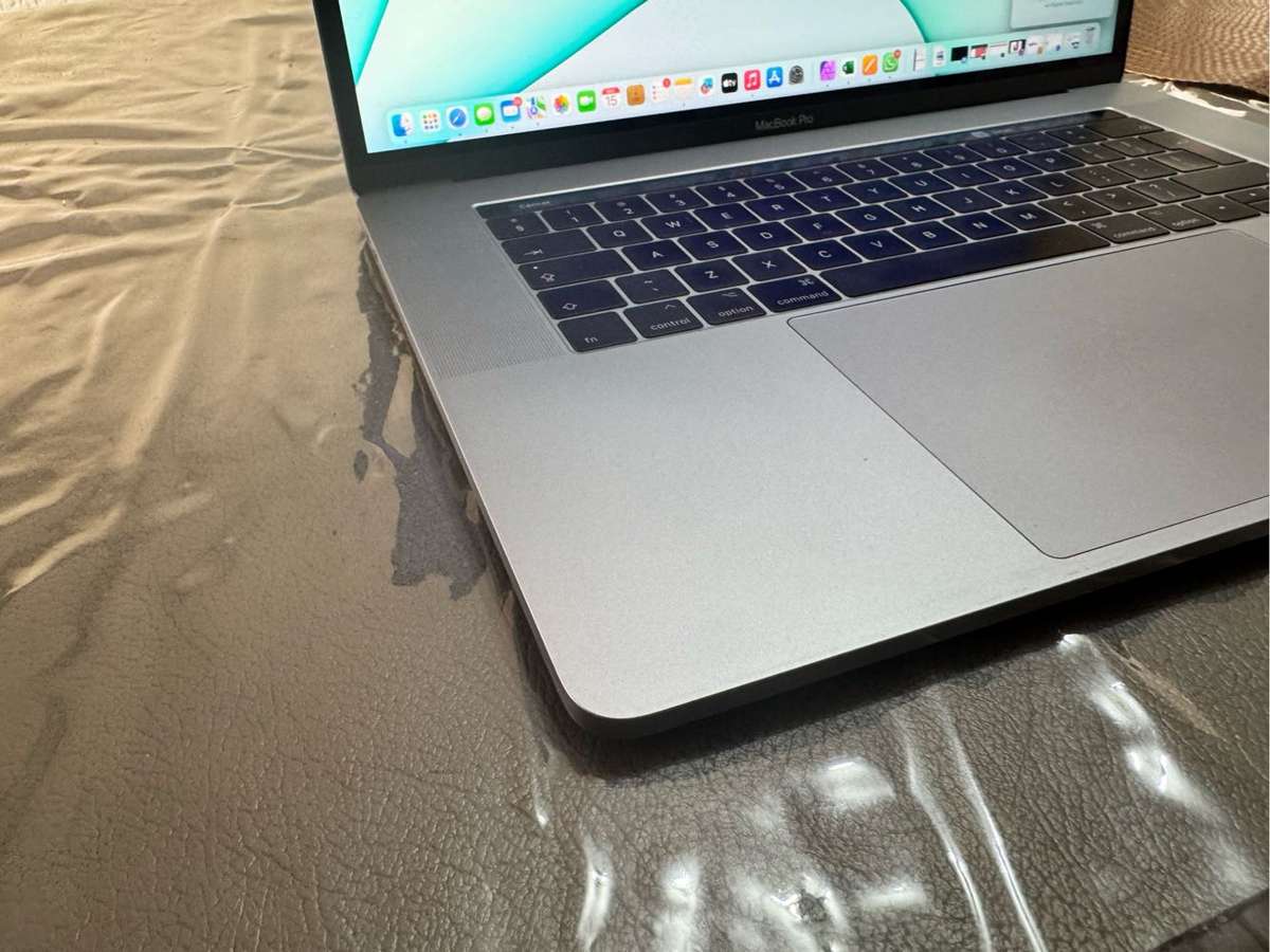 MacBook Pro 15 Inch 2017 Model with Touch Bar in immaculate condition