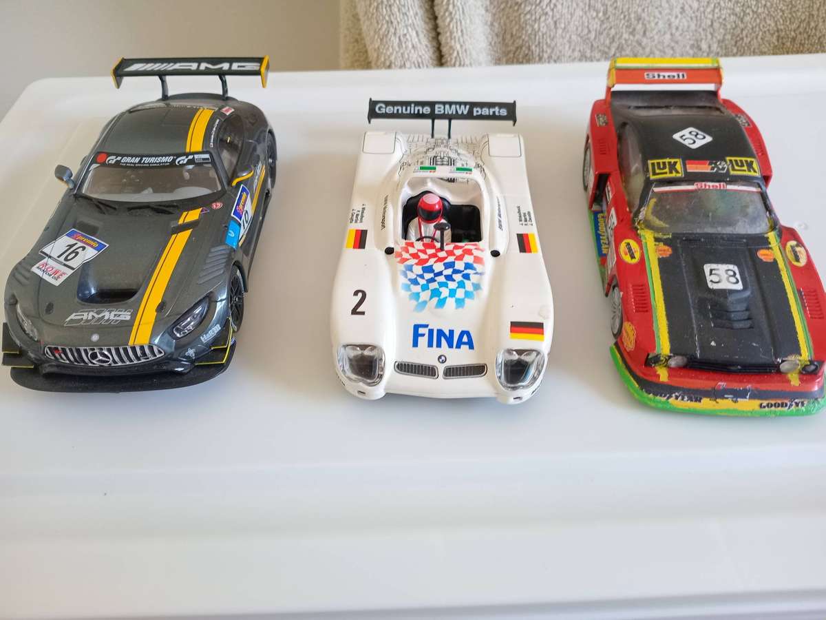 3 slot cars,  1x BMW ninco, 1 x scx Ford 1X Mercedes Benz Carrera Capri